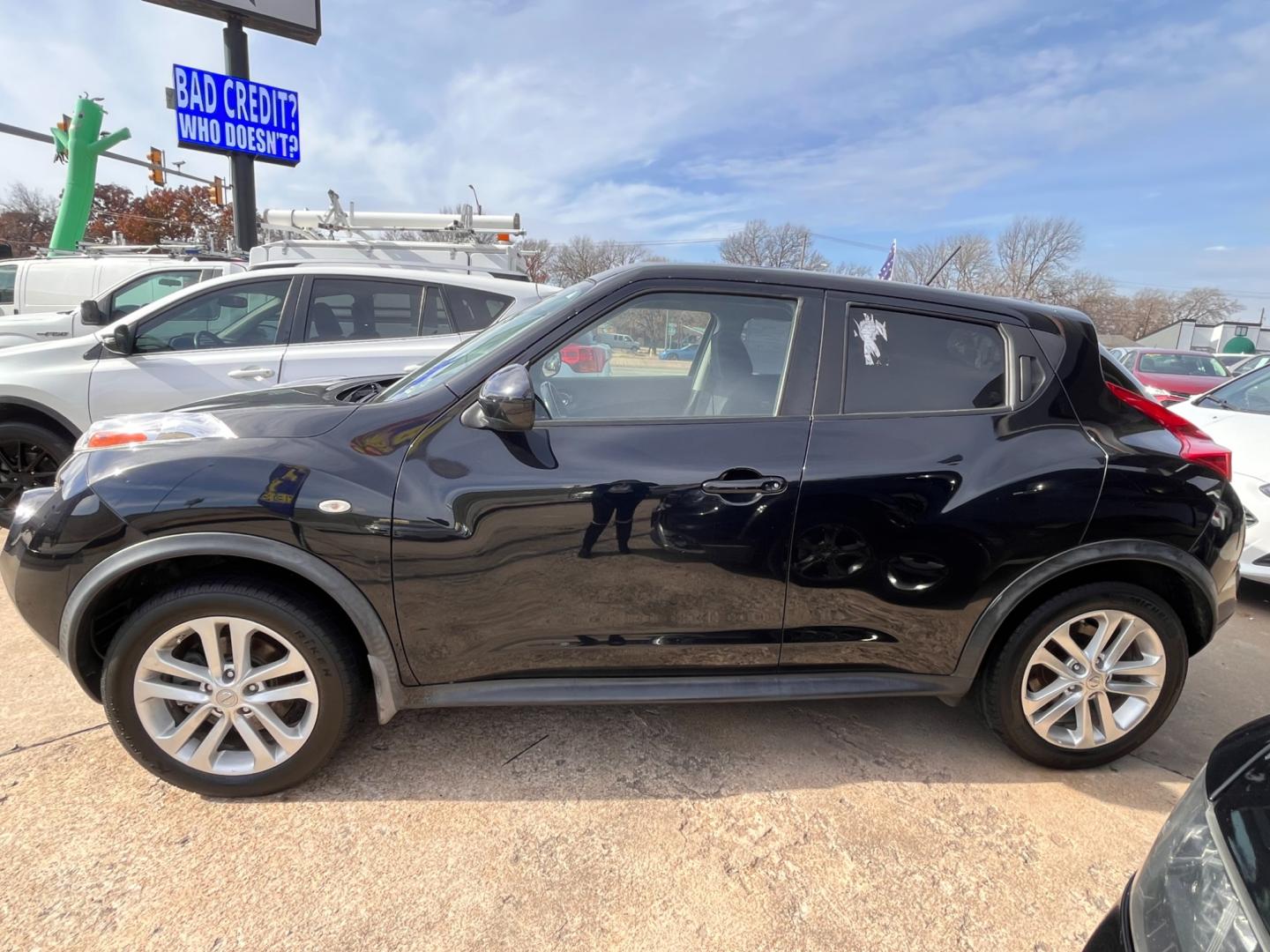 2013 BLACK NISSAN JUKE S; SL; SV; NISM S AWD (JN8AF5MV2DT) with an 1.6L L4 DOHC 16V engine, Continuously Variable Transmission transmission, located at 8101 E. Skelly Dr., Tulsa, OK, 74129, (918) 592-3593, 36.121891, -95.888802 - Photo#1